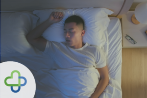 feature pic for blog. man in bed snoring sleeping